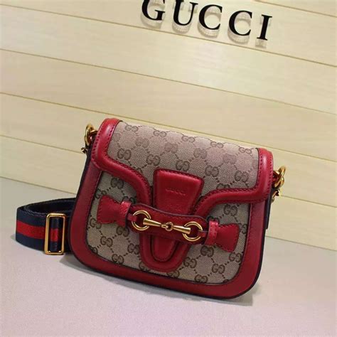 what stores sell gucci handbags.